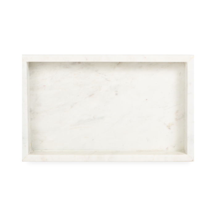 A collection of solid marble countertop pieces with a matte finish.