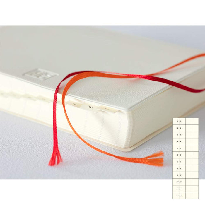 MD Notebook Diary (A6) 1 Day 1 Page 2025 — flat lay