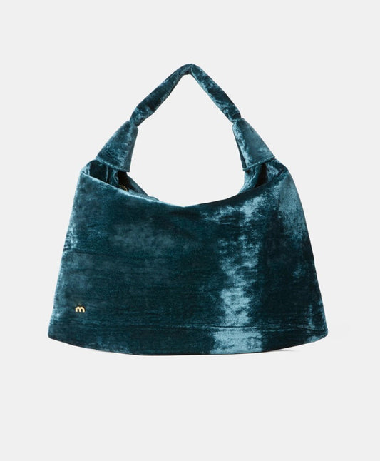 The MOMONI - FRANCOIS VELVET BAG is a teal blue hobo with crushed velvet, slouchy shape, wide handle, and a small gold "m" logo on the bottom left, shown against a plain light background.