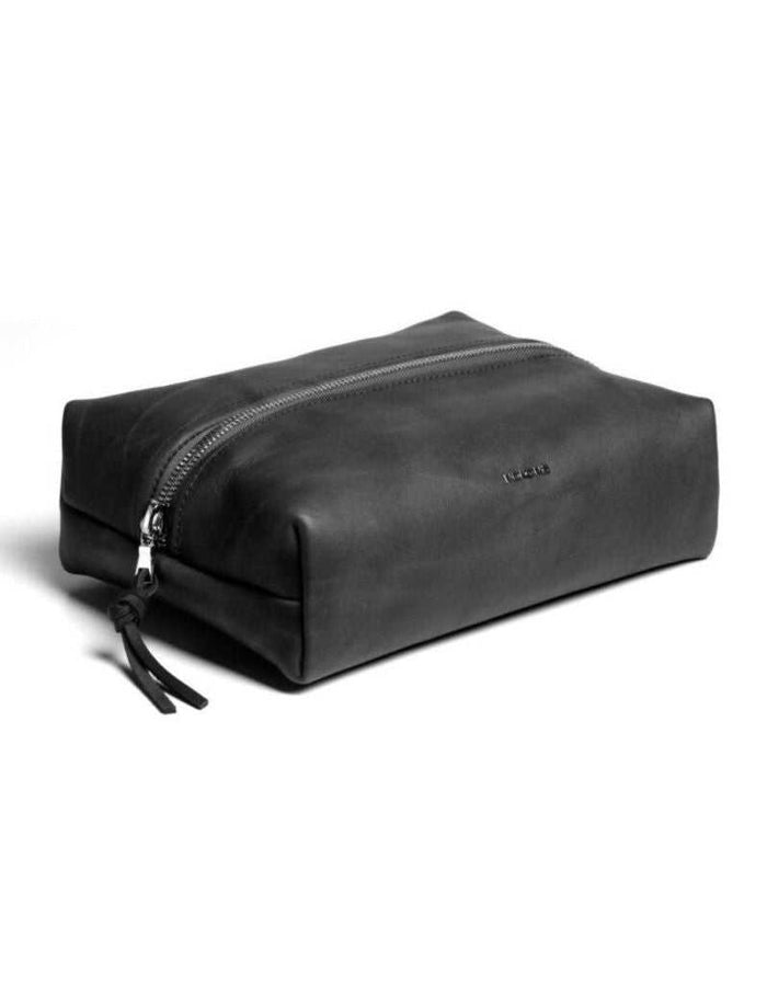 Black leather dopp kit with zipper for travel and grooming