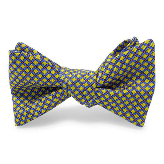 The BIRD DOG BAY PETER-BLAIR Cushions Silk Bow Tie in yellow features a blue checkered pattern, handmade design, adjustable neck sizing for a perfect fit, and is displayed against a white background.