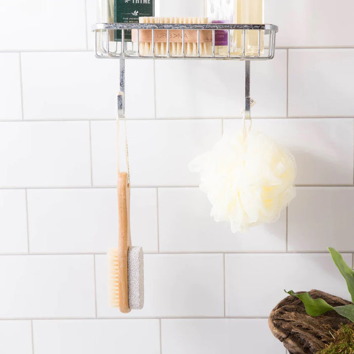 The EUROPEAN SOAPS, LLC PUMICE STONE WITH NAIL BRUSH features a wooden handle, natural bristles for nails, a pumice stone for exfoliation, and a looped fabric strap for easy use—ideal for smoothing and cleaning rough skin.