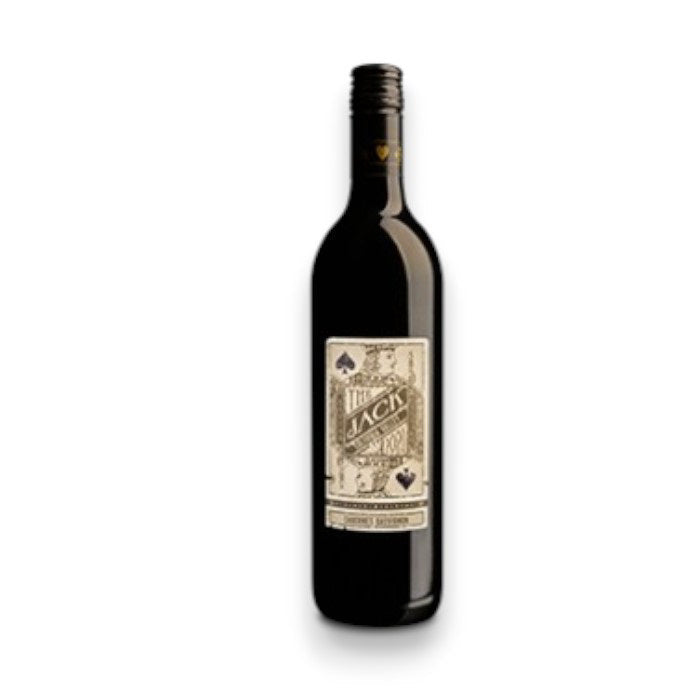A bottle of SAVIAH 'THE JACK' CABERNET 2021 from WINE: OCEAN SOUTH IMPORTS features a black screw cap and a playing card-style label with "Jack" and a jack of spades illustration. It's crafted from a Cabernet-based blend sourced from renowned Washington State vineyards on a white background.