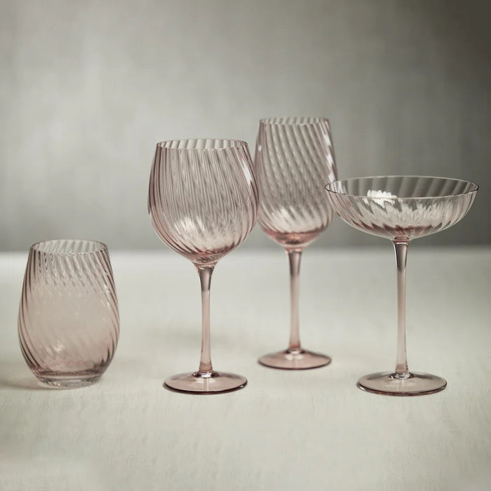 The SAVOY OPTIC SWIRL COCKTAIL GLASS by ZODAX features a clear, elegant design with a subtle optic swirl, slightly ribbed bowl, long slender stem, and round base, displayed against a plain white background.