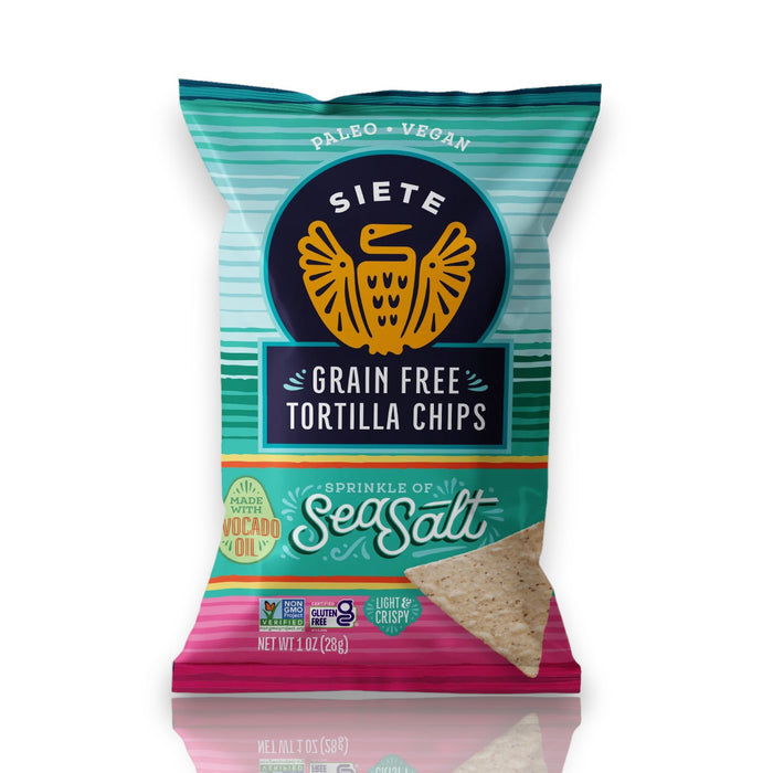 A bag of SIETE FOODS SIETE - TORTILLA CHIPS SEA SALT GRAIN FREE in teal, navy, and pink packaging with an eagle logo, labeled "Vegan" and "Made with Avocado Oil.