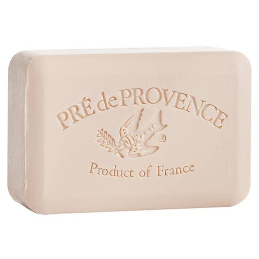 A rectangular beige coconut bar soap (250g) by EUROPEAN SOAPS, LLC, French-milled and embossed with "PRÉ de PROVENCE," a bird with a branch, and "Product of France" on the front.