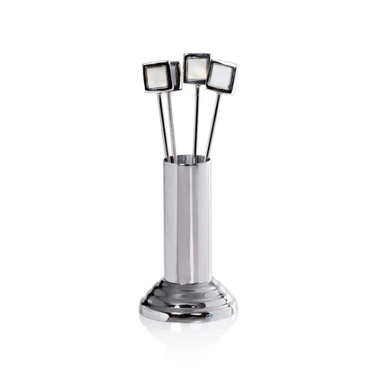 The ZODAX SPIGA Set of 4 Cocktail Picks with Stand features sleek metal picks with square mother of pearl tops in a metallic holder with round base. Ideal for stylish home bars. Set photographed on a plain white background.