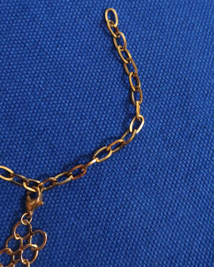 Gold chain with an extender and lobster claw clasp