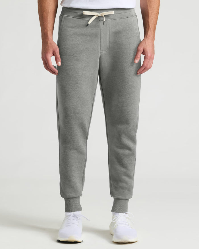 Medium Heather Gray Joggers with pockets, drawstring, and ribbed cuffs.