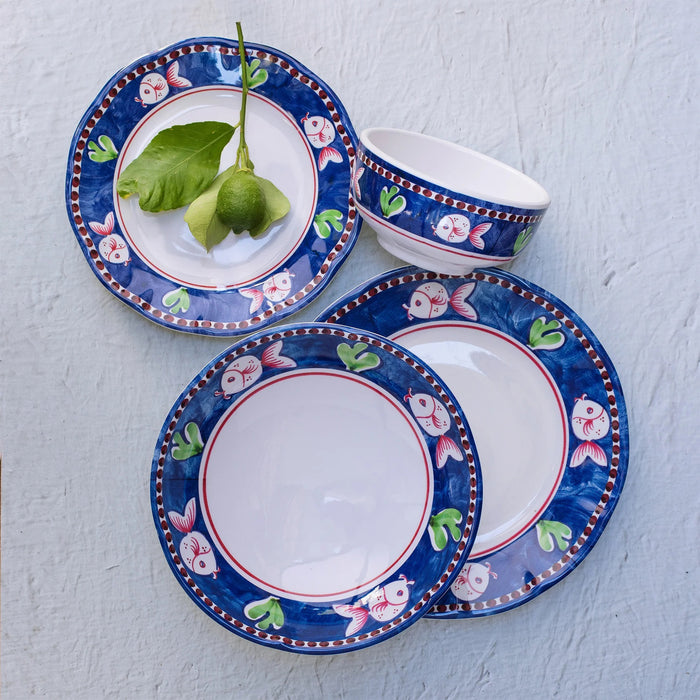 The VIETRI Melamine Campagna Dinner Plate features a round white center, an orange border with blue and white birds, red tulips, and green leaves—ideal for al fresco dining.