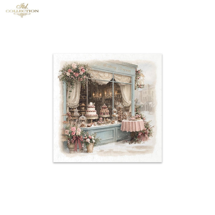 A square art print featuring a vintage bakery storefront illustration with pastel blue framing, floral decorations, cakes on display, and a soft snowy street scene. The print is centered on a white background with 'Ash Collection' branding in the top-left corner.