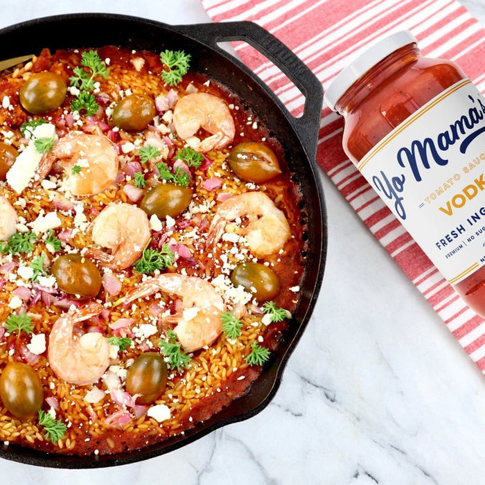 A 25 oz (708g) jar of YO MAMA'S - VODKA SAUCE by YO MAMA'S FOODS, featuring a white label and red lid. Highlights: fresh ingredients, keto certified, no sugar added, all-natural, and gluten-free.